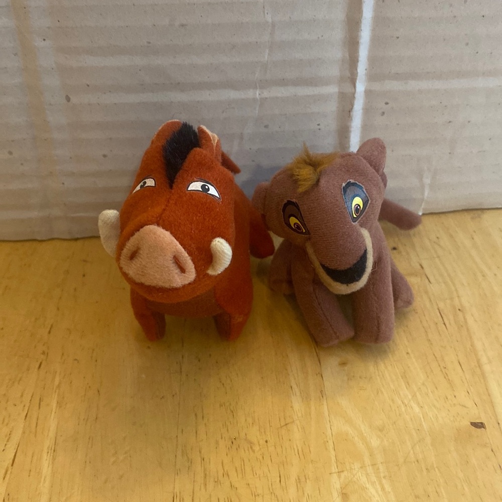 2 McDonald’s toys from Disney Lion King II Simba’s Pride. Kovu and Pumba.